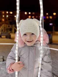 Portrait of smiling girl in snow