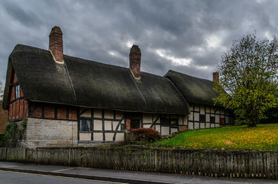 Old building against cloudy sky