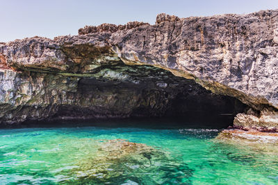 Scenic view of rocks in sea