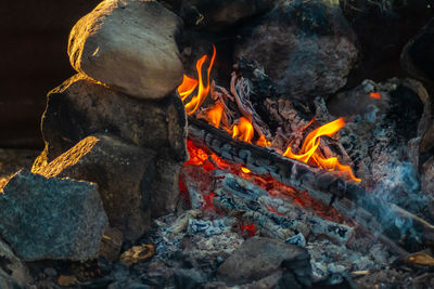 Close-up of fire on rock