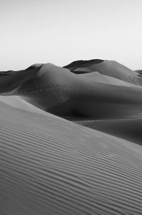 Scenic view of desert against clear sky