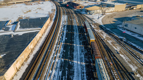 Empty railyard in winter with ice and snow