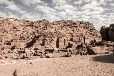 Panoramic view of rock formations against sky