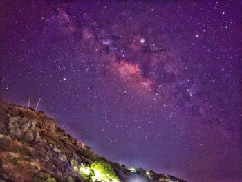 Low angle view of stars against sky at night