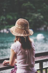 Rear view of woman looking at outdoor cafe