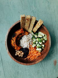 High angle view of chopped slices in bowl on table