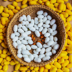 High angle view of eggs in basket for sale at market