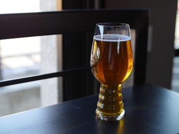 Close-up of beer in glass on table