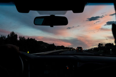 Road seen through car windshield