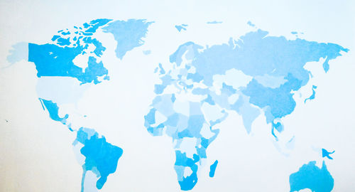 Close-up of blue paper against white background