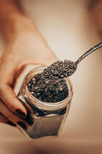 Close-up of hand holding ice cream