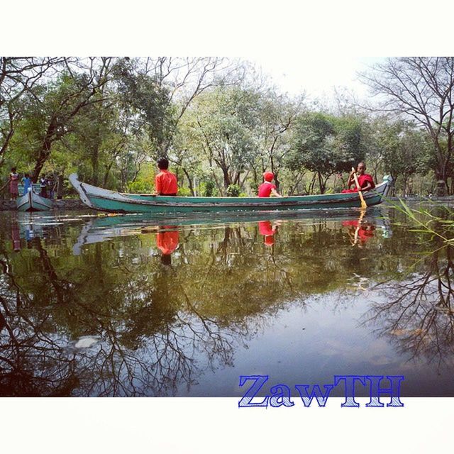 water, tree, lake, nautical vessel, transportation, boat, leisure activity, mode of transport, tranquility, men, lifestyles, reflection, nature, tranquil scene, waterfront, river, day