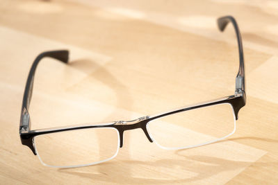 Close-up of sunglasses on table