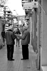 Woman standing in city