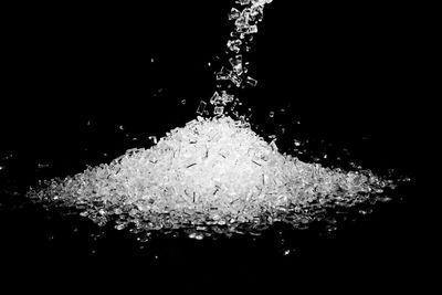 Close-up of splashing water against black background