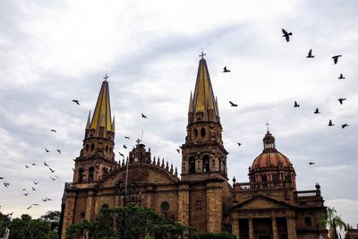 Low angle view of temple building against sky