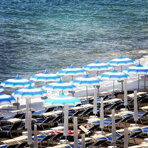 View of chairs on beach