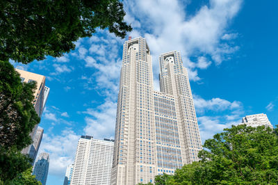 Low angle view of skyscrapers against sky