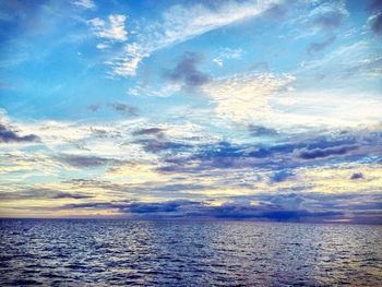 Scenic view of seascape against cloudy sky