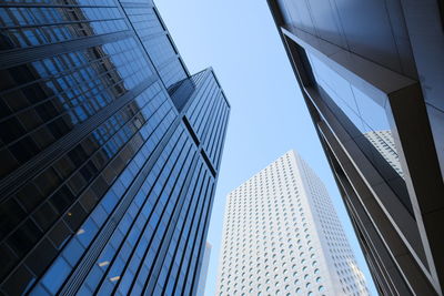 Low angle view of modern buildings against clear sky