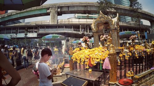 People at market stall