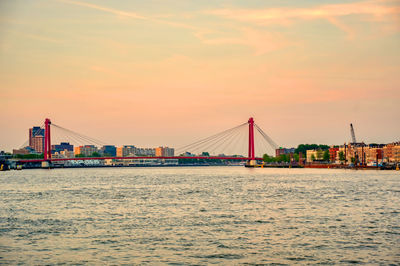 View of suspension bridge over sea