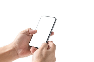 Midsection of person using mobile phone against white background