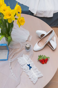 High angle view of bouquet on white table