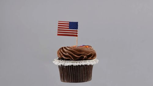 Flag against clear sky over white background