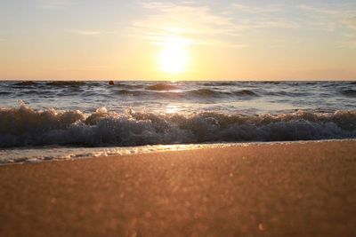 Scenic view of sea at sunset