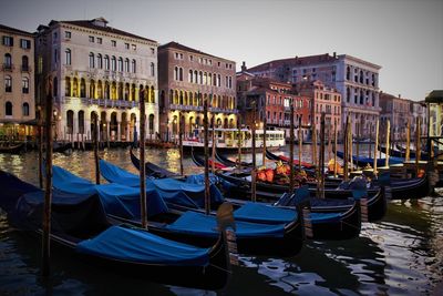 Boats moored in canal