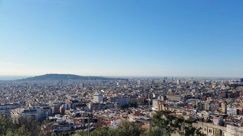 High angle view of cityscape against clear sky