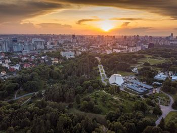 High angle view of buildings against sky during sunset