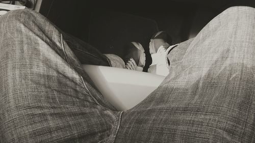 Close-up of woman reading book