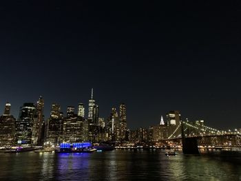 Manhattan from brooklyn bridge on a winter night