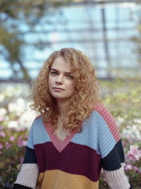 Portrait of young woman outdoors