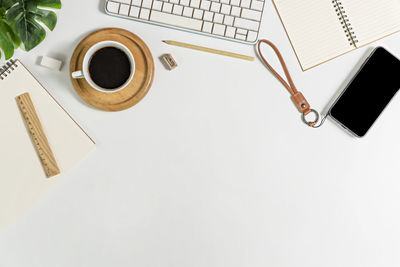 Directly above shot of coffee cup on table