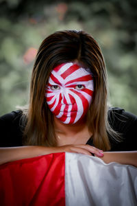 Portrait of young woman wearing mask