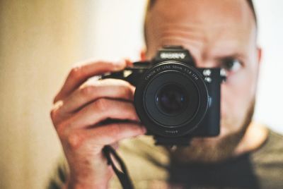 Midsection of man photographing