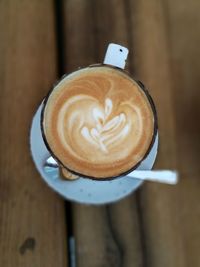 Directly above shot of cappuccino on table