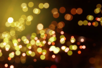 Defocused image of illuminated lights at night