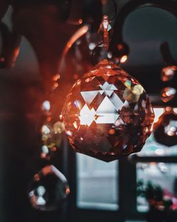 Close-up of illuminated christmas tree at home