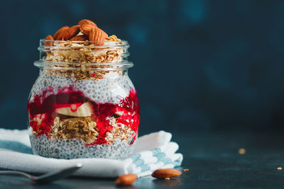 Close-up of dessert in jar on table