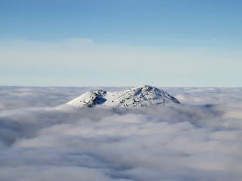 Scenic view of snowcapped mountain against sky