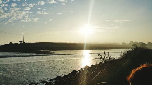 Sun shining over calm sea