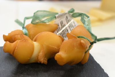 Close-up of orange slices in plate on table