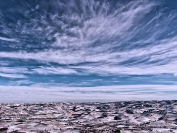 Scenic view of dramatic sky over landscape