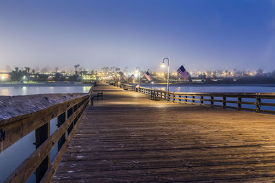 Pier over sea against sky