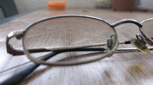 Close-up of eyeglasses on table