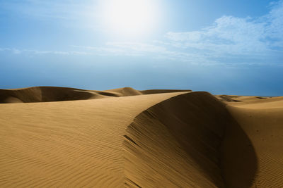 Scenic view of desert against sky